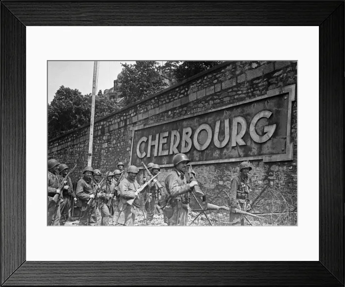 Framed Print : Soldiers of the US 79th Infantry Division seen here enter the fortified port of Cherbourg
