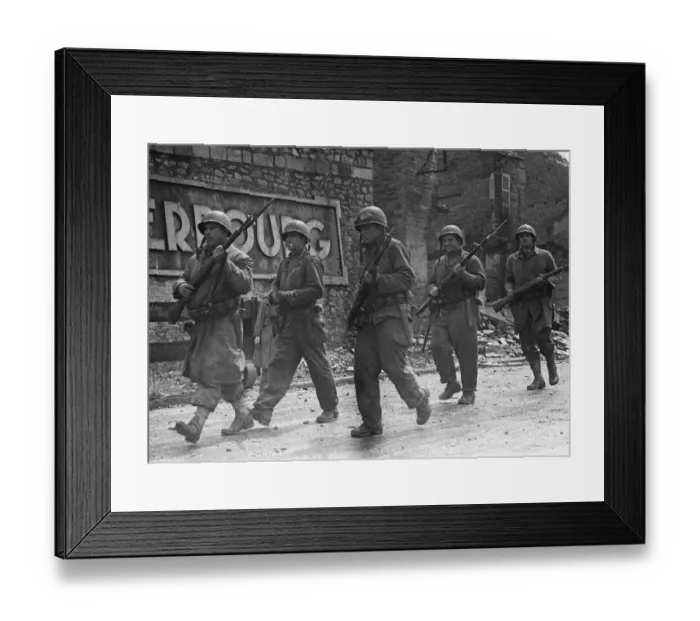 Framed Print : Soldiers of the US 79th Infantry Division seen here enter the fortified port of Cherbourg