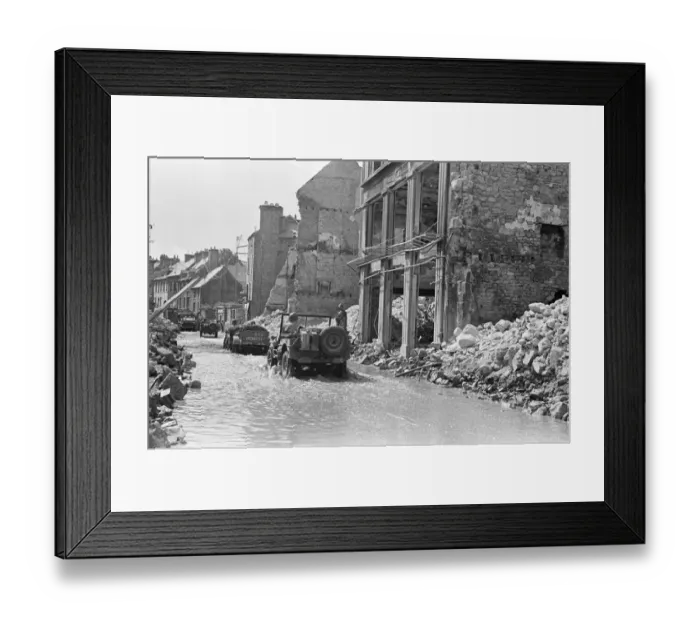Framed Print : American troops pass through the ruined buildings and wrecked German transport in Framed Print : American troops pass through the ruined buildings and wrecked German transport in