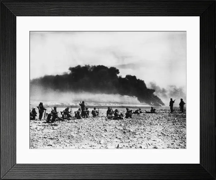 Framed Print : Infantry waiting to advance into Tobruk which is seen in the background with fires