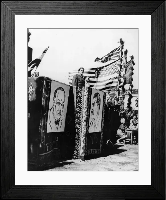Framed Print : Marshal Tito stands on the right as a Yugoslav commander addresses his troops during a
