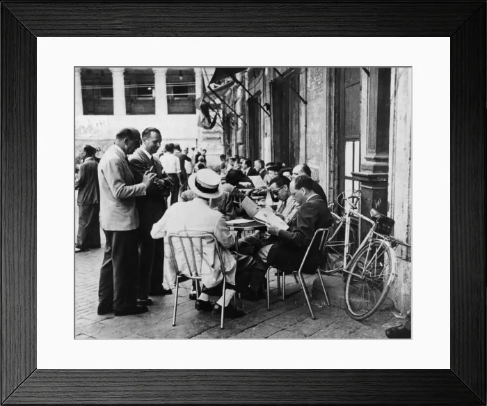 Framed Print : The Russian advance is being eagerly discussed by local residents at this round-table Framed Print : The Russian advance is being eagerly discussed by local residents at this round-table