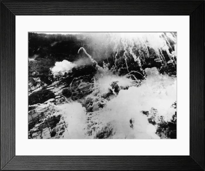 Framed Print : US planes drop phosphorous bombs over a Japanese radio station at Rabaul