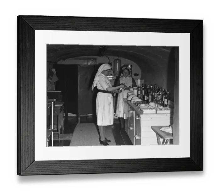 Framed Print : Nurses prepare the First Aid Post in Dover dug into the white cliffs. 22nd February 1945