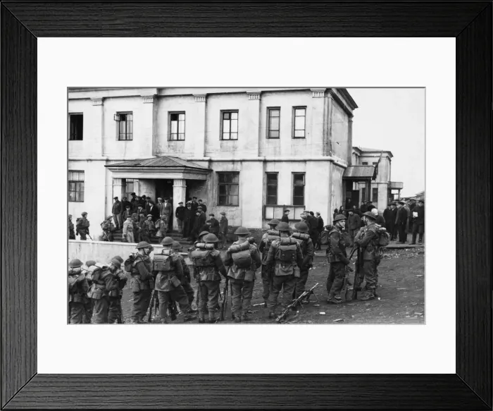 Framed Print : Canadian guard hear a mission briefing outside a communal building in Barentsburg Framed Print : Canadian guard hear a mission briefing outside a communal building in Barentsburg