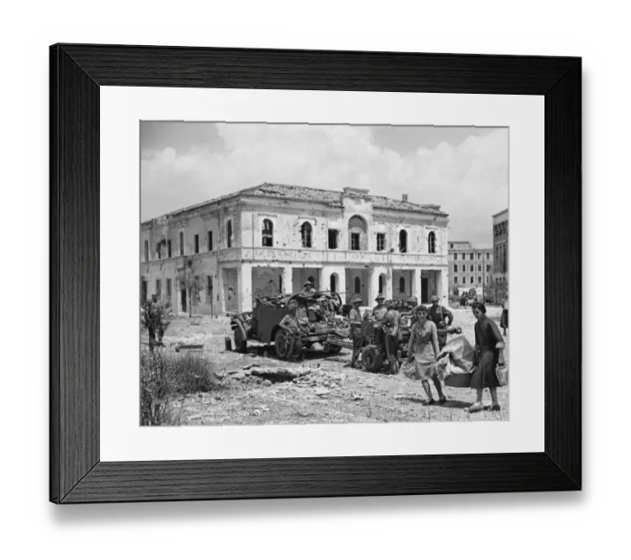 Framed Print : Fifth Army entry into Littoria, followed by Italian refugees. 6th June 1944 Framed Print : Fifth Army entry into Littoria, followed by Italian refugees. 6th June 1944