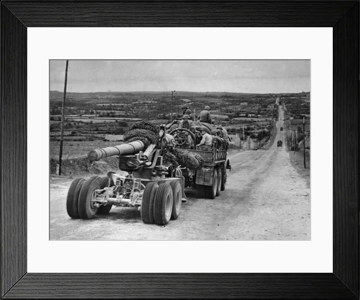 Framed Print : A truck carrying members of an Artillery unit roars over the highways of France Framed Print : A truck carrying members of an Artillery unit roars over the highways of France