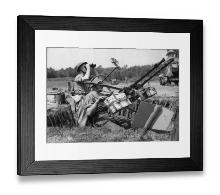 Framed Print : An Ack-Aok gunner manning a twin Browning gun, brought down one 51 the pilotless