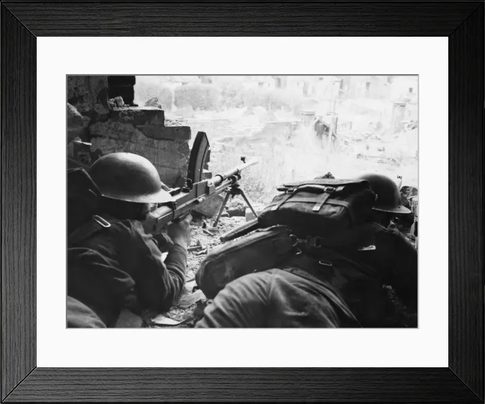 Framed Print : Bren Gunner and rifleman taking cover in a bombed house during training at army school