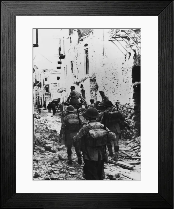 Framed Print : British infantry move through Centuripe in Sicily. 17th August 1943 Framed Print : British infantry move through Centuripe in Sicily. 17th August 1943