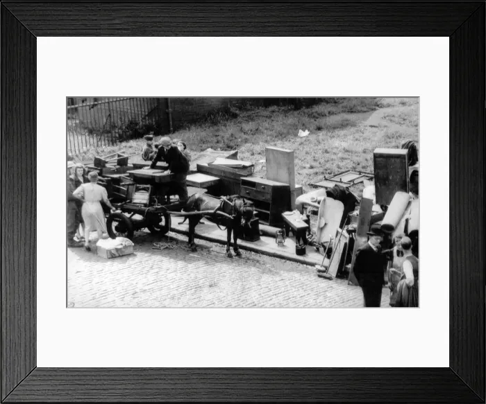Framed Print : The salvage of the wrecked Salford, Lancashire, homes after a plane had crashed Framed Print : The salvage of the wrecked Salford, Lancashire, homes after a plane had crashed