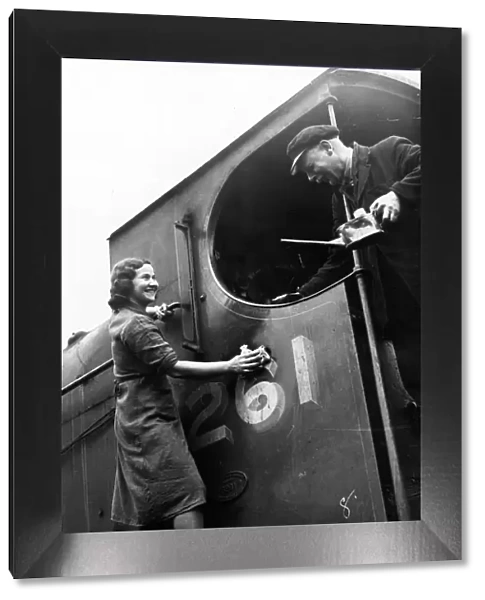 Women engine cleaners at work during World War II. Circa 1941