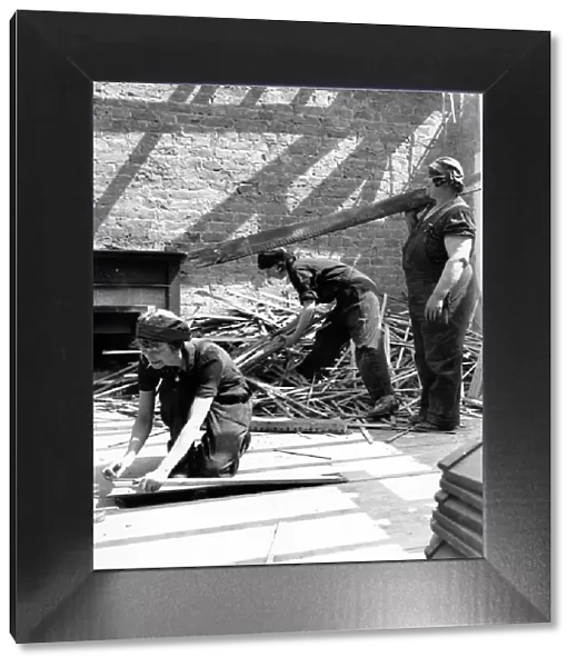 Women builders at work during World War II. June 1941