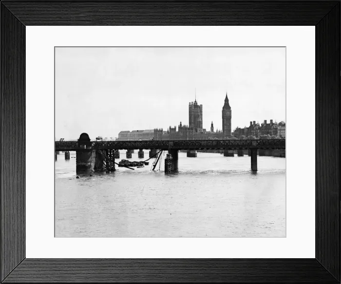 Framed Print : Air raid damage in London. A railway bridge damaged during a daylight raid by Hitler Framed Print : Air raid damage in London. A railway bridge damaged during a daylight raid by Hitler