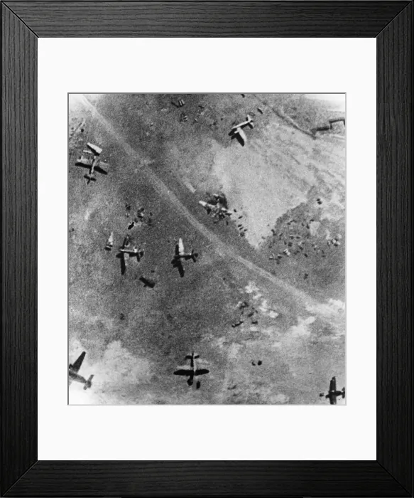Framed Print : Wreckage of a twin German aircraft on an enemy airfield after raid by R. A. F Framed Print : Wreckage of a twin German aircraft on an enemy airfield after raid by R. A. F