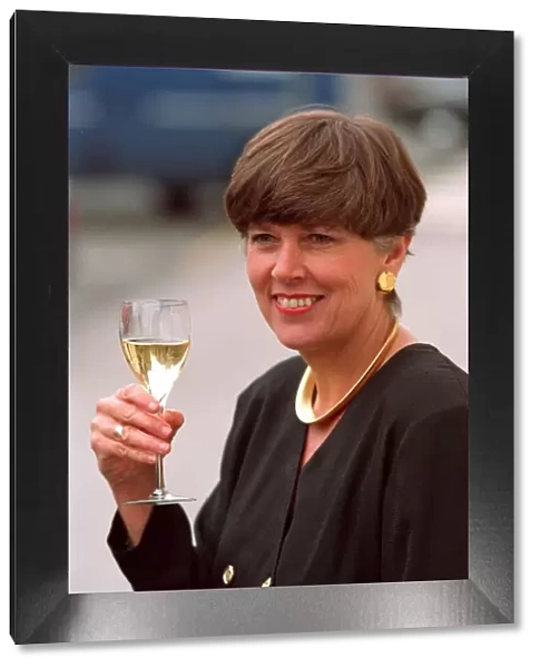 PRUE LEITH, WITH GLASS OF CHAMPAGNE, IN PHOTOCALL TO CELEBRATE BUSINESSWOMAN OF THE YEAR
