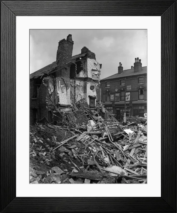 Framed Print : A house in Aston, Birmingham, collapsed after the building received a direct hit during Framed Print : A house in Aston, Birmingham, collapsed after the building received a direct hit during