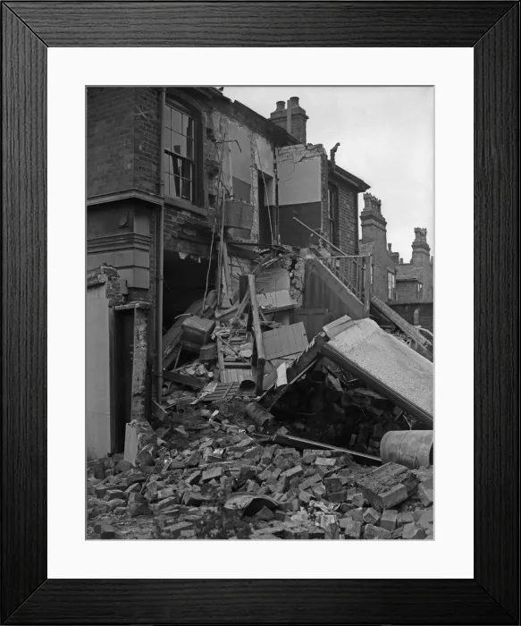 Framed Print : House in Moseley, Birmingham, destroyed during a bombing raid on the city Framed Print : House in Moseley, Birmingham, destroyed during a bombing raid on the city