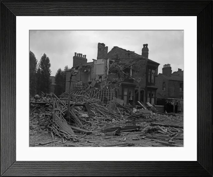 Framed Print : House in Moseley, Birmingham, destroyed during a bombing raid on the city Framed Print : House in Moseley, Birmingham, destroyed during a bombing raid on the city