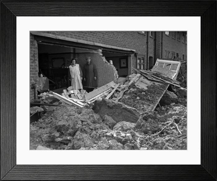 Framed Print : No one was injured. Twenty three people were in the back rooms of these two houses in