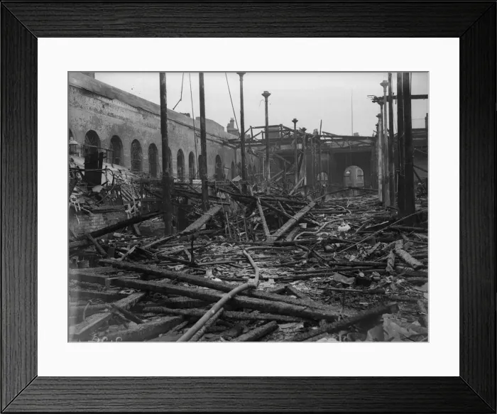 Framed Print : Fireman dampen down and sift through the burnt out shell of the Birmingham Market Hall Framed Print : Fireman dampen down and sift through the burnt out shell of the Birmingham Market Hall