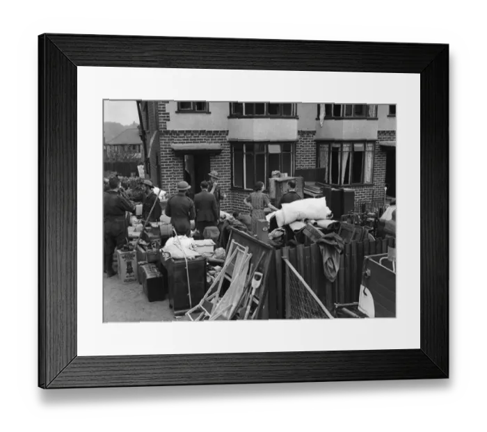 Framed Print : Householders and ARP recovery squad removing furniture from their bomb damage home in Framed Print : Householders and ARP recovery squad removing furniture from their bomb damage home in
