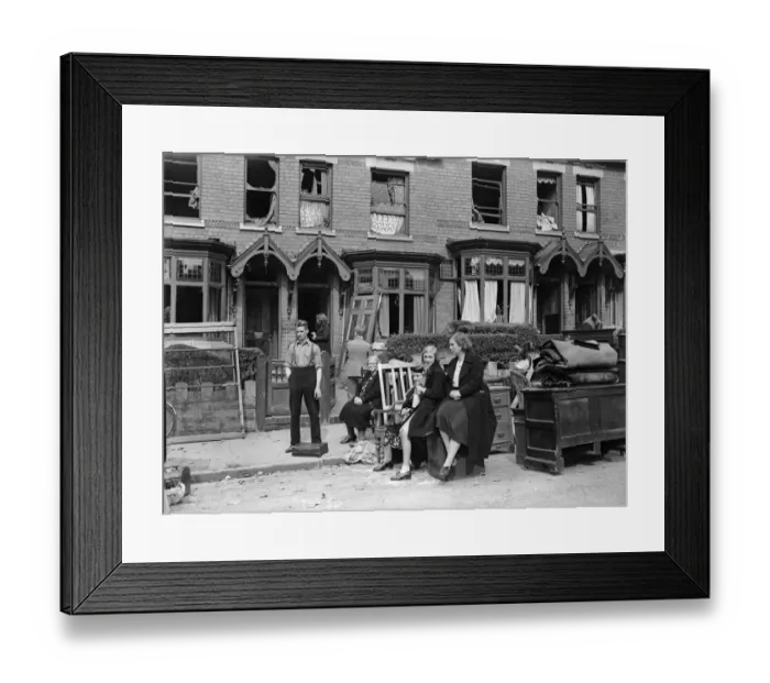 Framed Print : Householders removing furniture from their bomb damage home in Smallheath