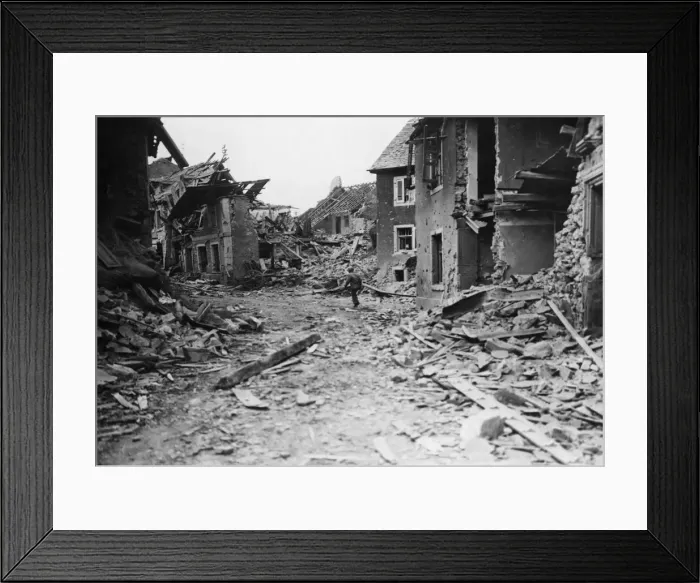 Framed Print : Wreckage wrought by American aircraft and artillery is noted by a US Third Army