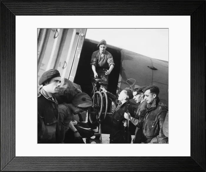Framed Print : Bicycles being unloaded from an aircraft on the captured aerodrome at Maison Blanche Framed Print : Bicycles being unloaded from an aircraft on the captured aerodrome at Maison Blanche