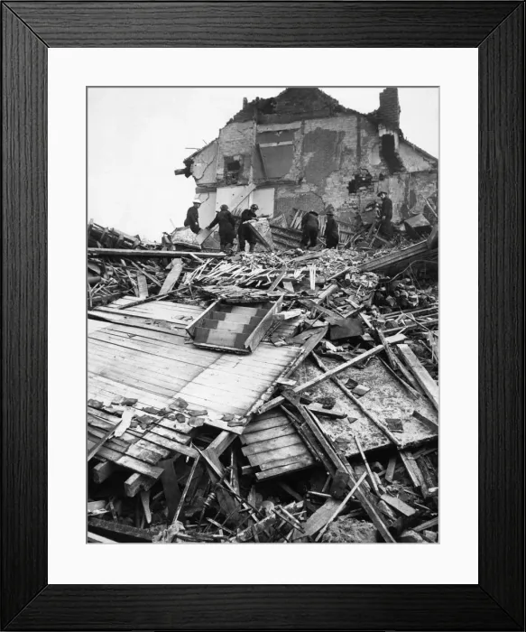 Framed Print : Rescue workers as seen from the bottom of a bomb crater from a raid on the 21st December Framed Print : Rescue workers as seen from the bottom of a bomb crater from a raid on the 21st December