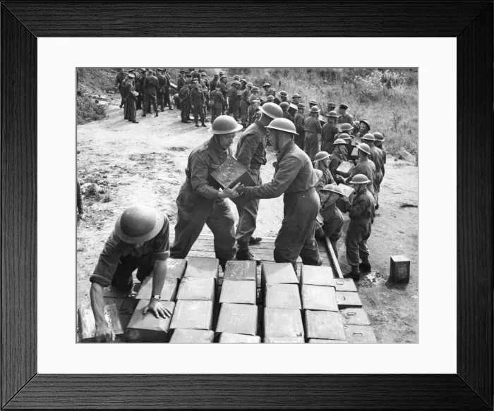 Framed Print : The Pioneer Corps handling tins and drums of petrol and oil using a human chain Framed Print : The Pioneer Corps handling tins and drums of petrol and oil using a human chain