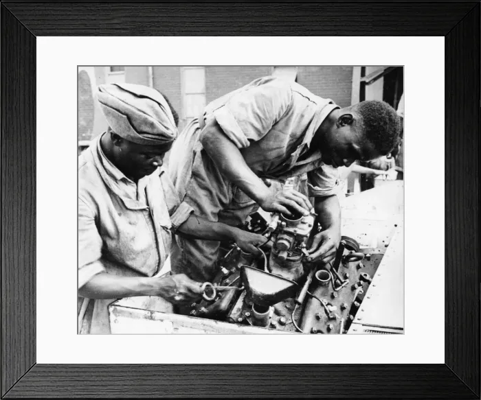 Framed Print : The Pioneer Corps (East African Division) making adjustments to a Bren Gun Carrier Framed Print : The Pioneer Corps (East African Division) making adjustments to a Bren Gun Carrier
