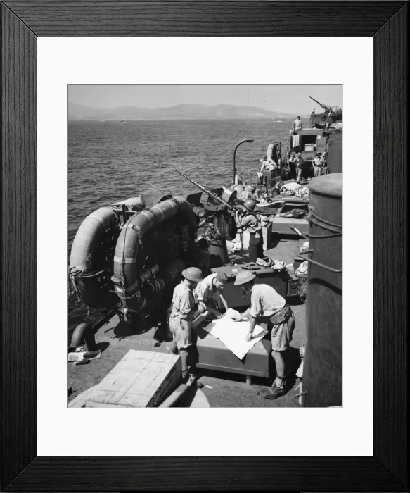 Framed Print : Within sight of the coast of France R. A. F. airmen study a map map at sea during Second Framed Print : Within sight of the coast of France R. A. F. airmen study a map map at sea during Second