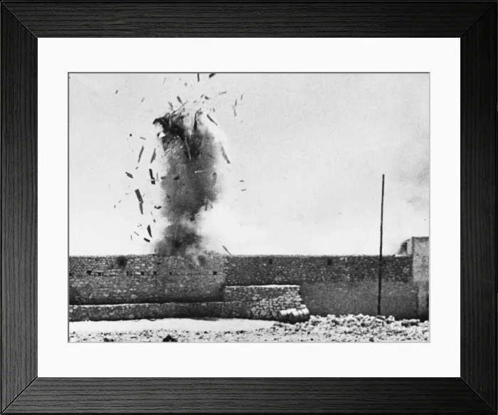 Framed Print : A British shell finds its mark at Fort Maddalena during the Second World War Framed Print : A British shell finds its mark at Fort Maddalena during the Second World War