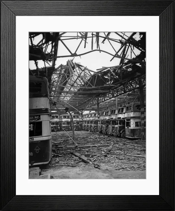 Framed Print : Burnt out buses and debris strewn across the floor of the Highgate Road Bus Garage Framed Print : Burnt out buses and debris strewn across the floor of the Highgate Road Bus Garage