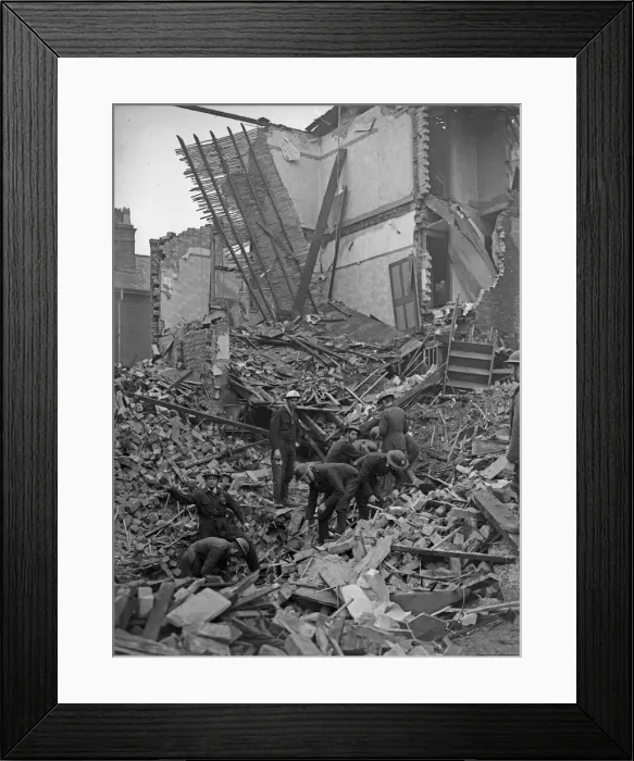 Framed Print : A rescue squad at work searching for survivors of a house which received a direct hit Framed Print : A rescue squad at work searching for survivors of a house which received a direct hit
