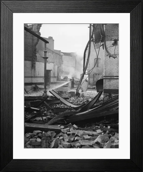 Framed Print : Firemen dampening down the CWS shop and offices in Pershore Street, Birmingham