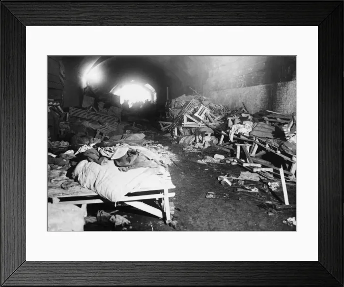 Framed Print : Damaged beds inside a bomb shelter during the Second World War. 17th February 1941 Framed Print : Damaged beds inside a bomb shelter during the Second World War. 17th February 1941