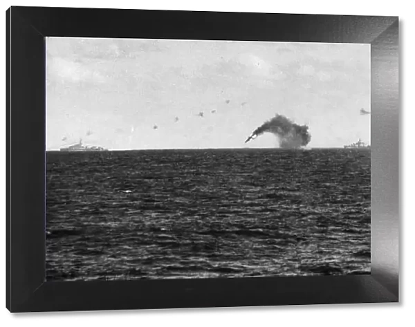 A Savoia bomber of the Italian Air Force crashes in to the sea after a failed attack
