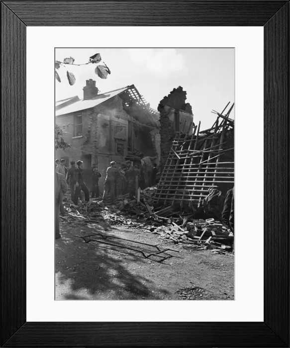 Framed Print : Scene in an English street after a bomb has hit the area. Folkestone in Kent Framed Print : Scene in an English street after a bomb has hit the area. Folkestone in Kent