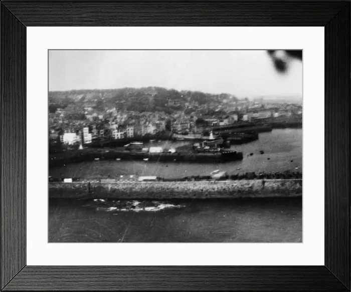 Framed Print : Beaufort aircraft of RAF Coastal Command bomb German ships lying alongside the quay at St