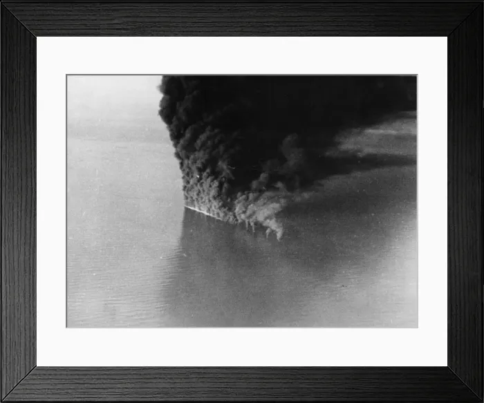 Framed Print : A German tanker ablaze to the water line after an attack by RAF Coastal Command in Framed Print : A German tanker ablaze to the water line after an attack by RAF Coastal Command in