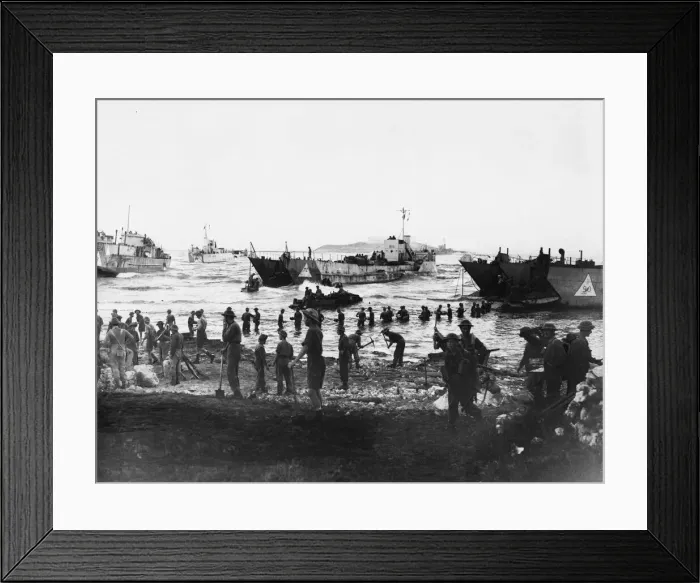 Framed Print : Troops unloading at Anzio. Men up to their waists in water, unloading stores Framed Print : Troops unloading at Anzio. Men up to their waists in water, unloading stores