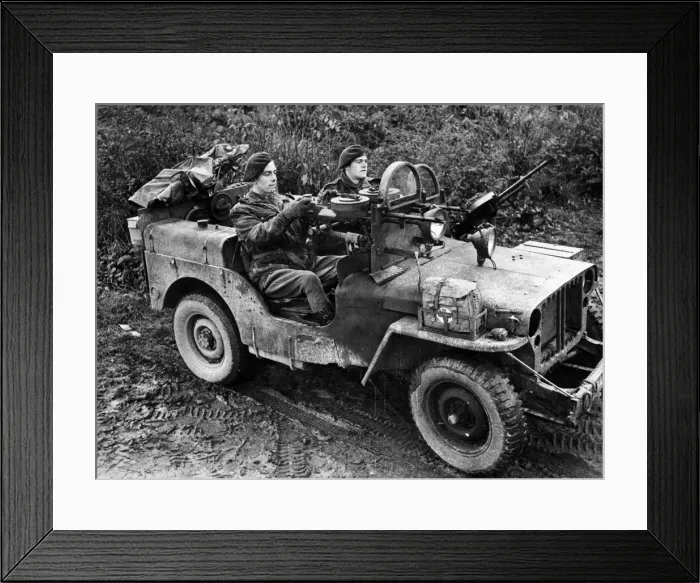 Framed Print : British troops drive into Germany. A jeep manned by Sergeant A Schofield