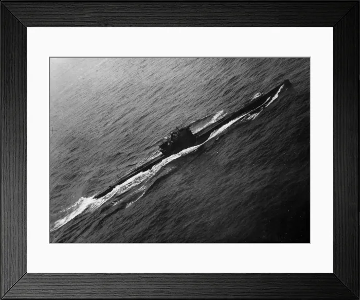 Framed Print : A surrendered German U-boat in the English channel heads to an Allied port under guard Framed Print : A surrendered German U-boat in the English channel heads to an Allied port under guard
