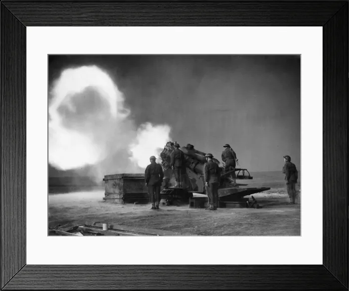 Framed Print : A coastal crew operating a 9. 2 howitzer gun in action on the coast of England during