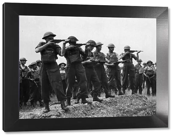 Members of the Home Guard practice with Sten Guns during training exercises in Reading