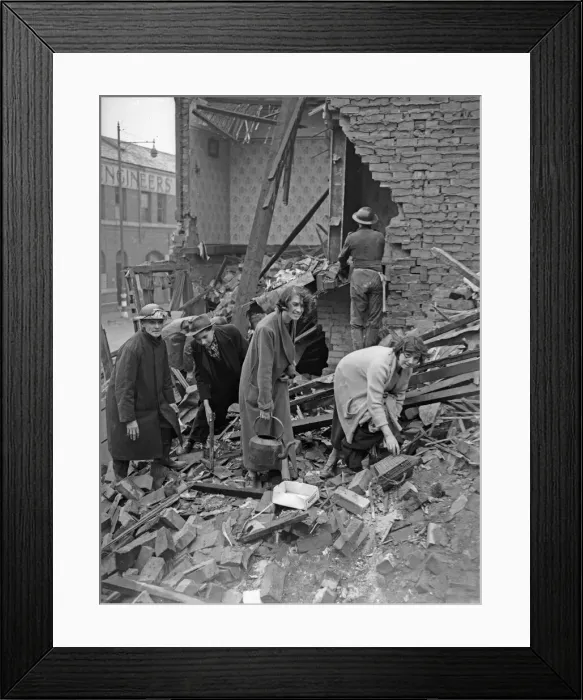 Framed Print : Householders search through the remains of their bombed home, searching for belongings Framed Print : Householders search through the remains of their bombed home, searching for belongings
