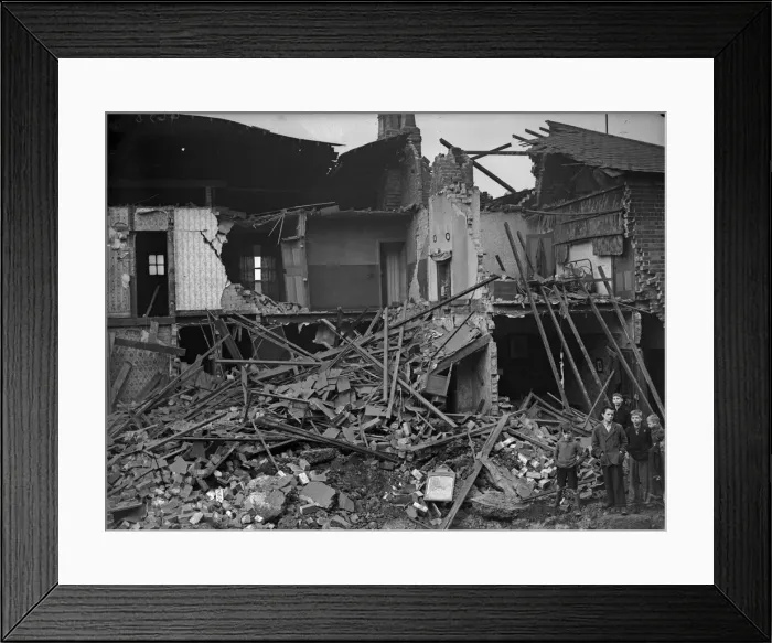 Framed Print : Young boys gather around a water filled crater in Temple Row, Birmingham Framed Print : Young boys gather around a water filled crater in Temple Row, Birmingham