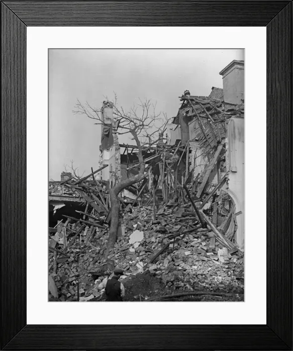 Framed Print : A house destroyed by a bomb off Newtown Row, Birmingham, following a raid on the city Framed Print : A house destroyed by a bomb off Newtown Row, Birmingham, following a raid on the city